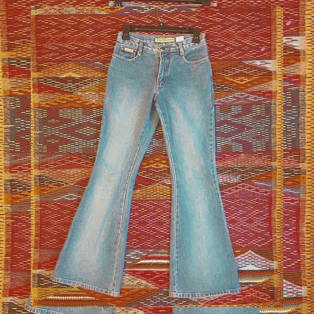 Size 1/28in waist,10 rise,32 inseam super skinny boot cut jeans by Zana•di jeans